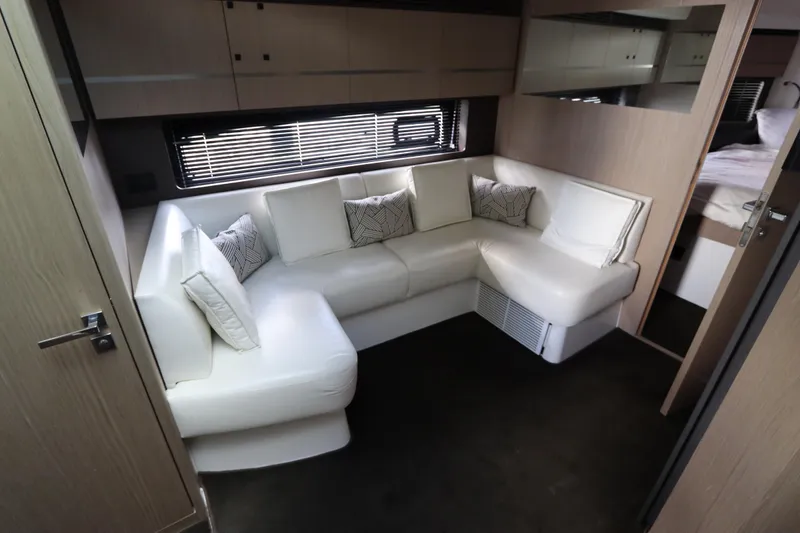  Yacht Photos Pics Luxurious interior of 2020 Azimut Nexus X47 yacht with white leather seating.