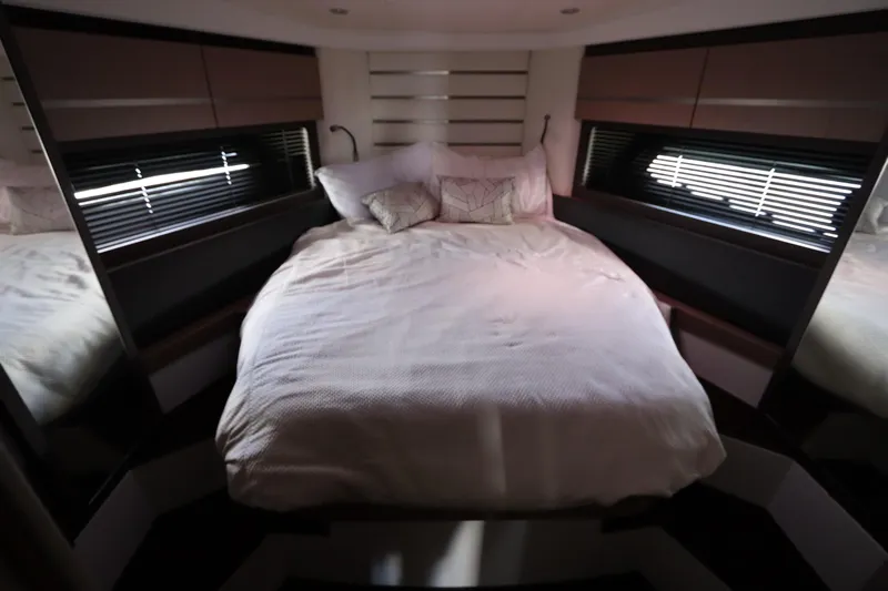  Yacht Photos Pics Luxurious bedroom interior of 2020 Azimut Nexus X47 yacht with cozy bedding.
