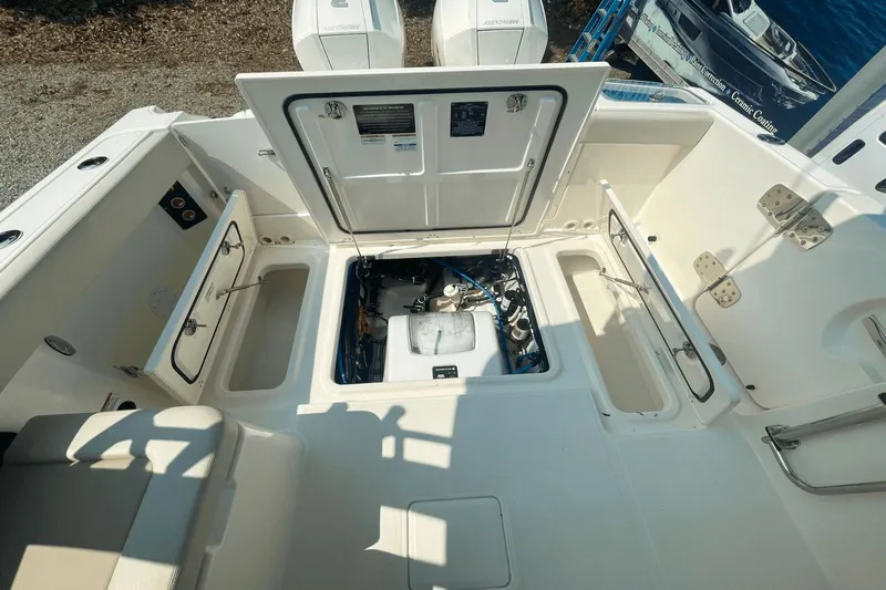  Yacht Photos Pics Boston Whaler 280 Vantage 2022, open engine hatch and storage compartments.