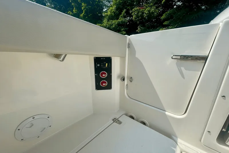  Yacht Photos Pics 2022 Boston Whaler 280 Vantage interior detail with control panel.