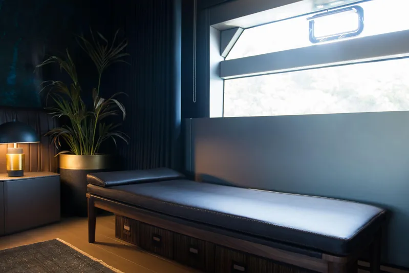  Yacht Photos Pics Luxurious interior of 2025 Mazu Yachts Mazu 82 with sleek daybed and modern decor.