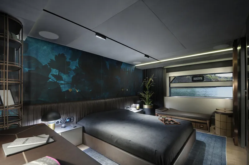  Yacht Photos Pics Luxurious bedroom interior of 2025 Mazu Yachts Mazu 82, featuring modern design and scenic window view.