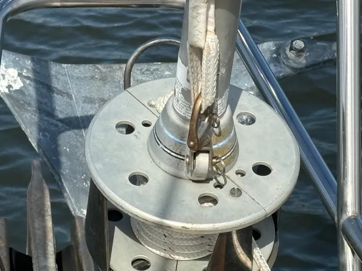Andante Yacht Photos Pics Close-up of a 1995 Island Packet 37 sailboat's anchor windlass on deck.