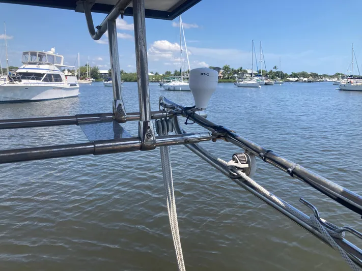 Andante Yacht Photos Pics Sailboat rigging on a 1995 Island Packet 37, with marina and boats in the background.