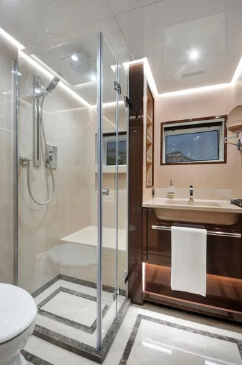 Lazzara Uhv 100 Yacht Photos Pics Luxurious bathroom in 2026 Lazzara UVH 100 yacht with modern shower and elegant fixtures.