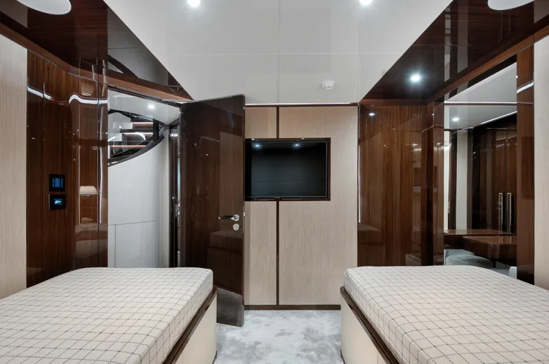 Lazzara Uhv 100 Yacht Photos Pics Luxurious interior of 2026 Lazzara UVH 100 yacht with twin beds and modern decor.