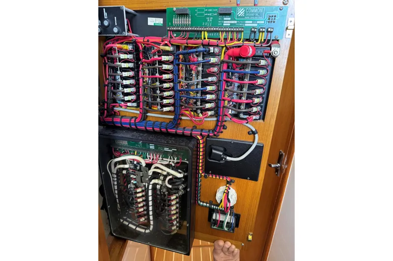 Renegade Yacht Photos Pics Electrical panel of a 2008 Cabo 35 Flybridge boat with organized wiring.