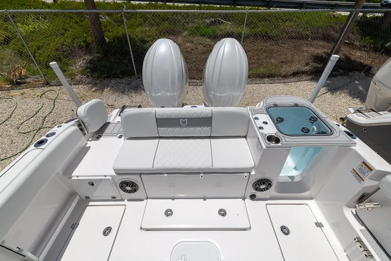  Yacht Photos Pics 2026 Sea Fox 268 Commander boat interior with seating and storage compartments.