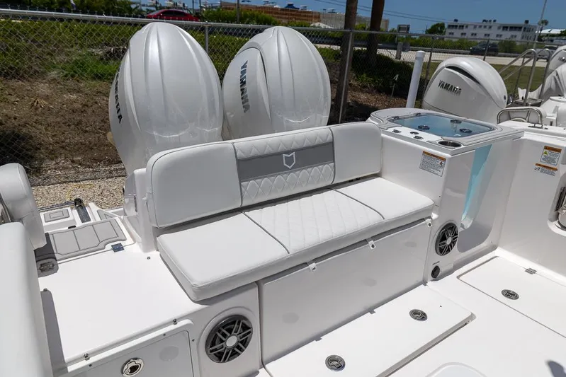  Yacht Photos Pics 2026 Sea Fox 268 Commander boat interior with Yamaha engines and cushioned seating.
