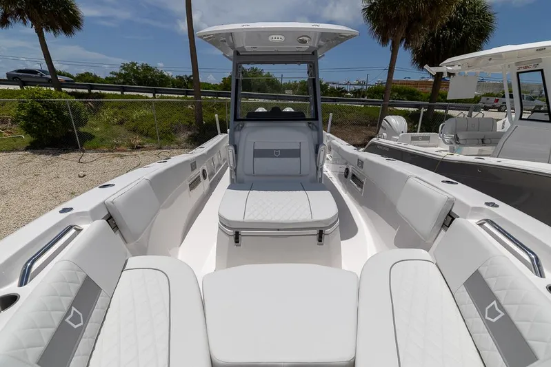  Yacht Photos Pics 2026 Sea Fox 268 Commander boat interior with white seating and modern design.