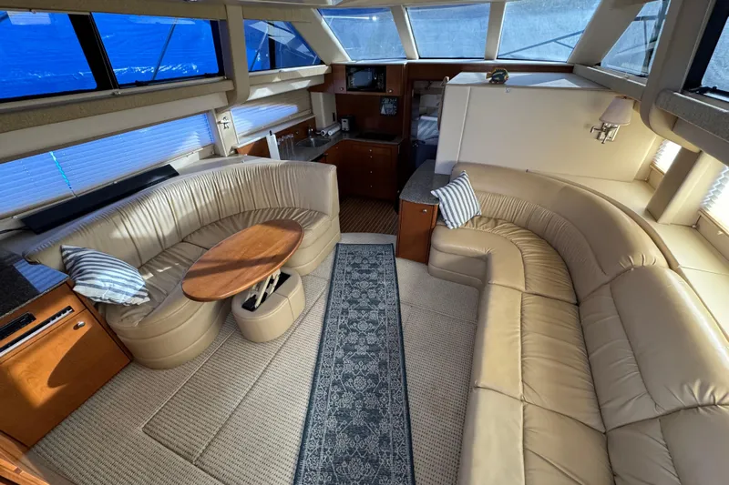 Comfort Zone Yacht Photos Pics Luxurious interior of 2005 Meridian 368 Motoryacht with leather seating and elegant decor.