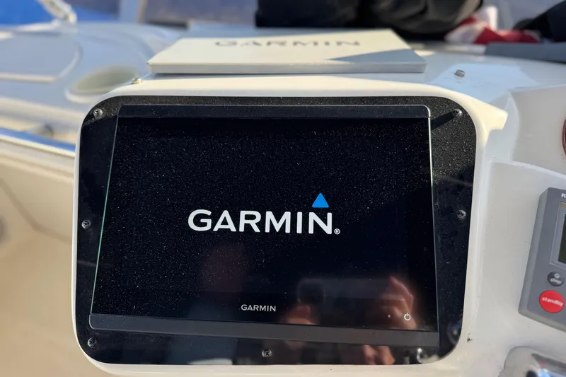 Comfort Zone Yacht Photos Pics Garmin navigation system on 2005 Meridian 368 Motoryacht dashboard.