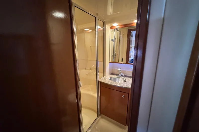 Comfort Zone Yacht Photos Pics Bathroom interior of 2005 Meridian 368 Motoryacht with shower and sink.