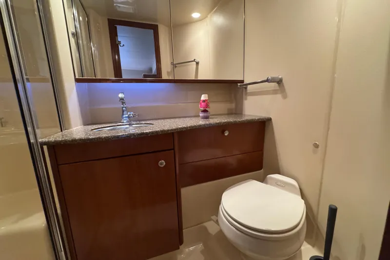 Comfort Zone Yacht Photos Pics Luxurious bathroom in 2005 Meridian 368 Motoryacht with modern fixtures and elegant design.