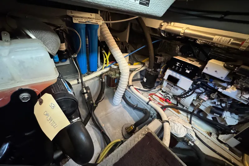 Comfort Zone Yacht Photos Pics Engine room of 2005 Meridian 368 Motoryacht with various mechanical components.