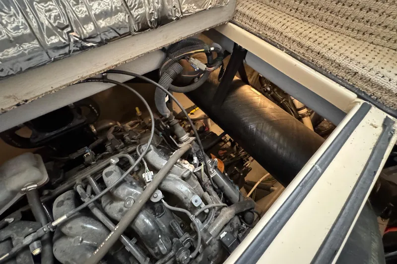 Comfort Zone Yacht Photos Pics Engine compartment of a 2005 Meridian 368 Motoryacht, showcasing mechanical components.