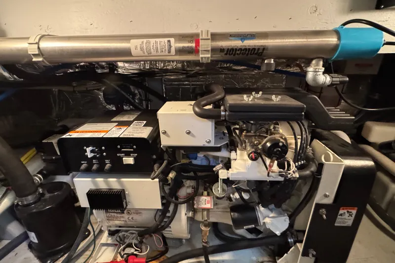 Comfort Zone Yacht Photos Pics Engine room of 2005 Meridian 368 Motoryacht showcasing mechanical components and systems.