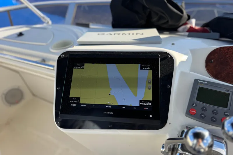 Comfort Zone Yacht Photos Pics Helm of 2005 Meridian 368 Motoryacht with Garmin navigation display.