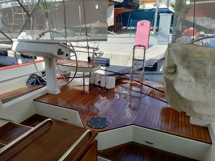 Felitsata II Yacht Photos Pics Cockpit of 2011 Hanse 62 DS yacht with wooden deck and steering wheel.