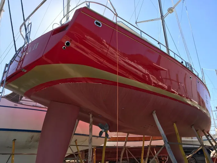Felitsata II Yacht Photos Pics Red 2011 Hanse 62 DS yacht on dry dock, viewed from below.