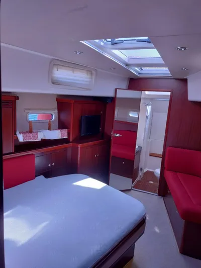 Felitsata II Yacht Photos Pics Luxurious interior of 2011 Hanse 62 DS yacht with skylight and modern furnishings.
