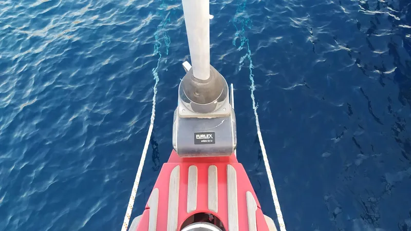 Felitsata II Yacht Photos Pics Bow of 2011 Hanse 62 DS yacht with blue ocean background.