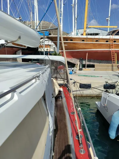 Felitsata II Yacht Photos Pics Sailboat docked at marina, Hanse 62 DS, 2011 model, with other boats in background.