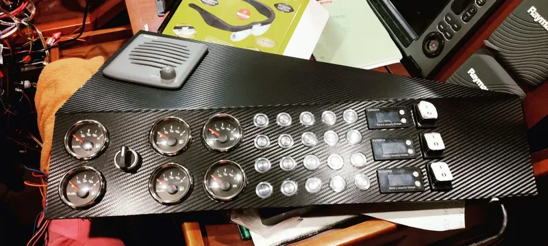 Felitsata II Yacht Photos Pics Control panel of a 2011 Hanse 62 DS yacht with gauges and switches.