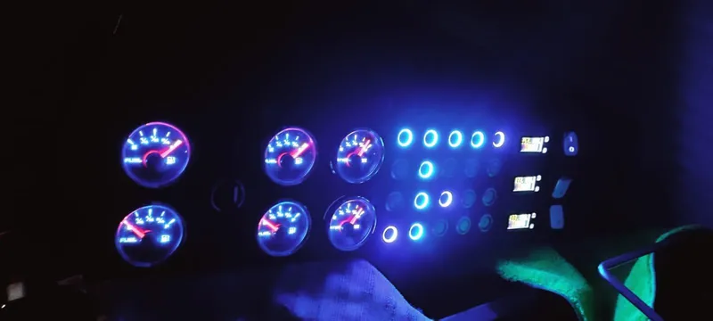 Felitsata II Yacht Photos Pics Control panel with illuminated gauges and switches on a 2011 Hanse 62 DS yacht.