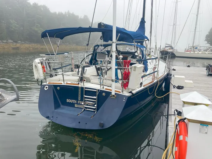 Harmony Yacht Photos Pics Sailboat docked in a foggy marina, 2005 Tillotson-Pearson J-160 model.