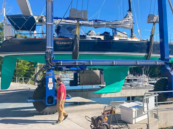 Harmony Yacht Photos Pics Sailboat "Harmony" being lifted at marina, Tillotson-Pearson J-160, 2005 model.