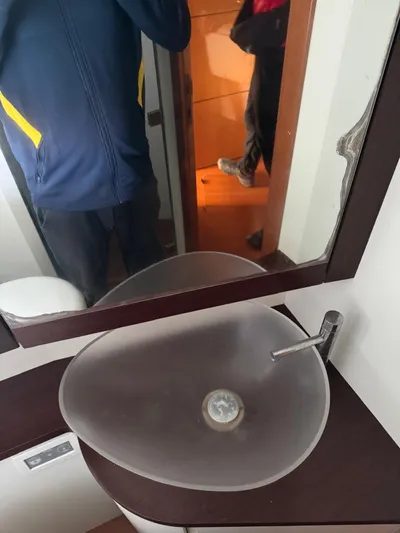  Yacht Photos Pics Frosted glass sink in 2006 Pershing 56 yacht bathroom.