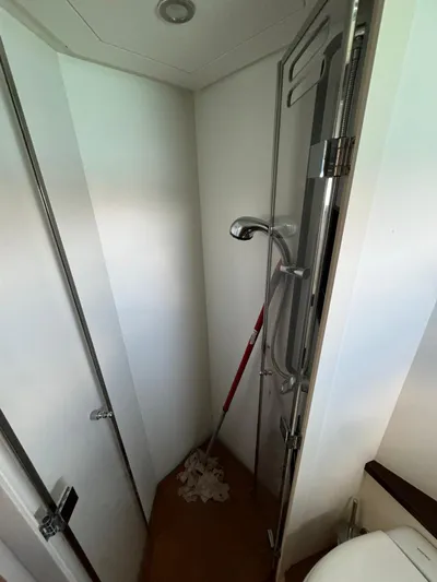  Yacht Photos Pics Shower area in 2006 Pershing 56 yacht with cleaning supplies.