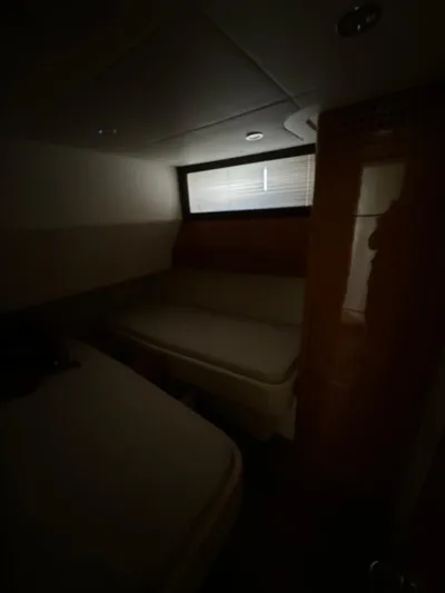  Yacht Photos Pics Dimly lit cabin interior of a 2006 Pershing 56 yacht.