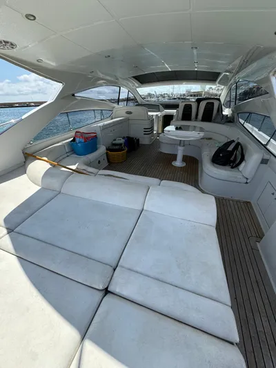  Yacht Photos Pics Luxurious 2006 Pershing 56 yacht interior with spacious seating and elegant design.