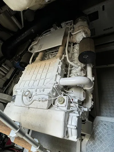  Yacht Photos Pics Engine of a 2006 Pershing 56 yacht, showcasing intricate mechanical components.