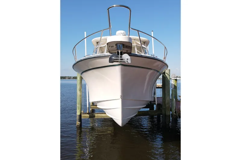 Kristy Lynn Yacht Photos Pics 2010 Grady-White Express 330 boat docked on a sunny day.