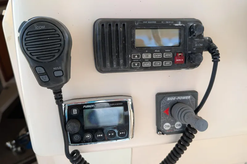 Kristy Lynn Yacht Photos Pics Control panel of a 2010 Grady-White Express 330 boat with communication devices.