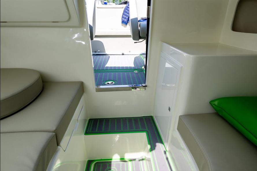 Interior of 2023 Performance e801 boat, featuring modern seating and sleek design elements.