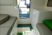 Interior of 2023 Performance e801 boat, featuring modern seating and sleek design elements.