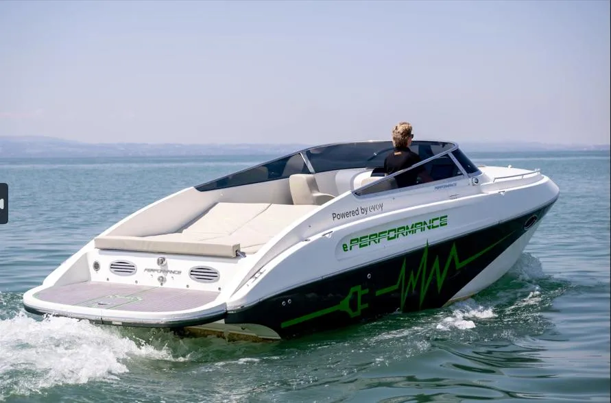 2023 Performance e801 electric boat cruising on a calm lake.