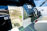 2023 Performance e801 boat interior with modern dashboard and cozy cabin space.