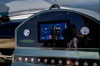 Dashboard of 2023 Performance e801 boat with digital display and control buttons.