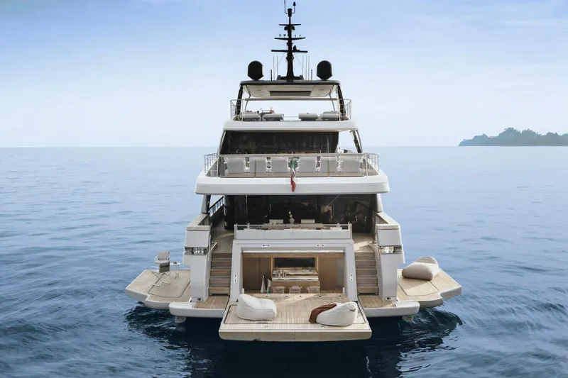 Sd132 Yacht Photos Pics Luxurious 2028 Sanlorenzo SD132 yacht on serene ocean waters, rear view.