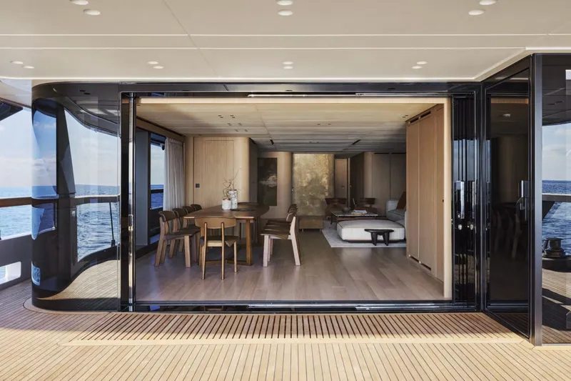 Sd132 Yacht Photos Pics Luxurious interior of 2028 Sanlorenzo SD132 yacht with elegant dining area and ocean view.