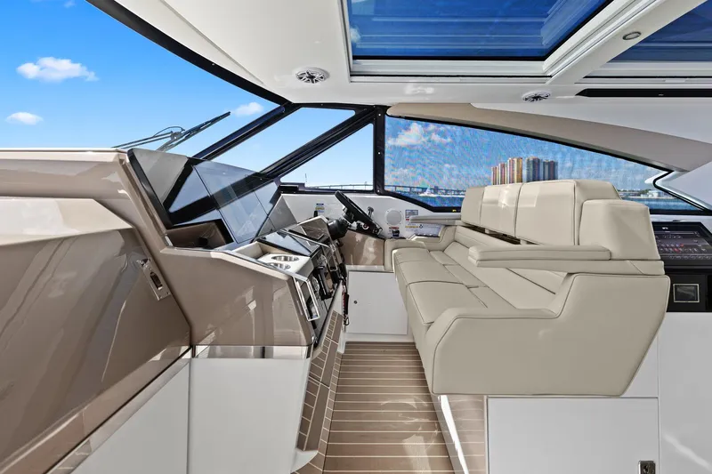  Yacht Photos Pics 2025 Formula 500 Super Sport Crossover interior with luxurious seating and modern dashboard.