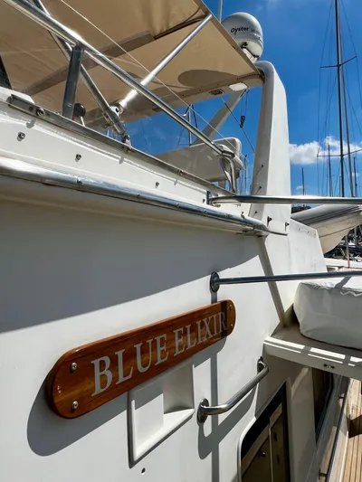  Yacht Photos Pics Fleming 55 yacht "Blue Elixir" docked, showcasing sleek design and elegant craftsmanship.