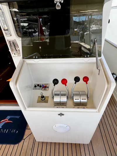  Yacht Photos Pics Control panel on a 1996 Fleming 55 yacht with throttle levers and switches.
