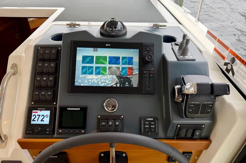  Yacht Photos Pics Helm of 2026 Beneteau Swift Trawler 41 Fly with advanced navigation controls.
