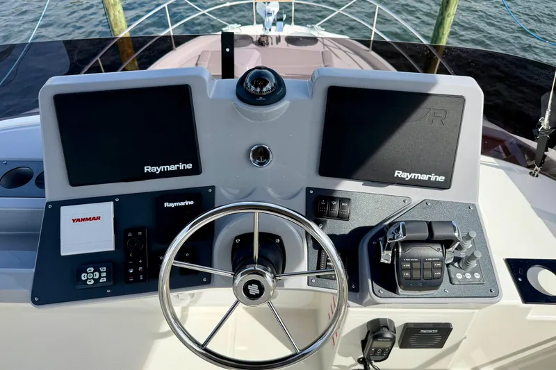  Yacht Photos Pics Helm of 2026 Beneteau Swift Trawler 41 Fly with Raymarine navigation system.